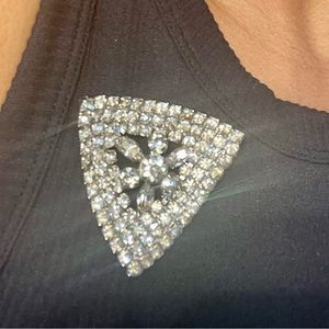 Vintage rhinestone brooch of the 1940’s are a comeback in a  triangle shape
